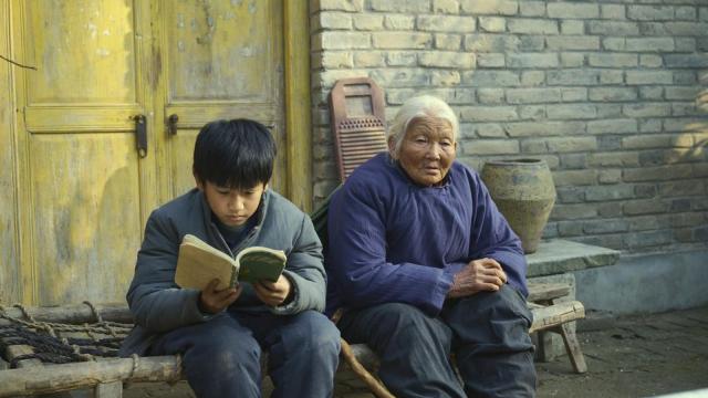 Wang Shang and Zhang Chuwen in Living the Land